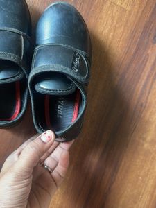 Black school shoes in size 8