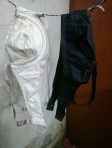 Cream And Black Bra.