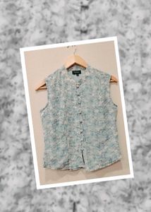 SLEEVELESS TOP