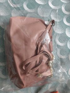 Stylish Pink Handbag with Chain Detail