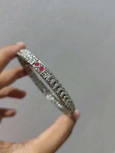 Stylish Silver Bangle with Stone Accents