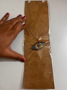 Indo western long chain with single pendant