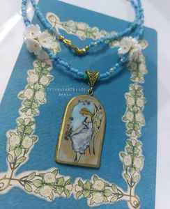 Angel By The Window Clay Pendant Blue Necklace