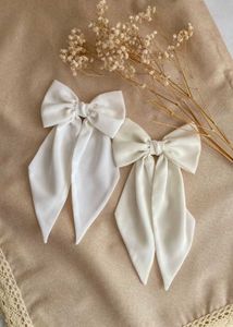 White Bow Hair Accessory