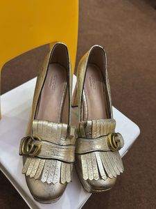 Gucci Gold Heels