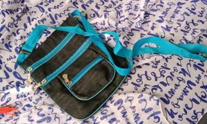 Sling Bags Of Combo Colours, 🟣 And 🔵 With 4 Big Compartments With 1 Small Compartment Also With Adjustable Straps Zips At Good Condition Material Is Soft And Flexible