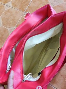 A Beautiful Tomoto Red Hand Bag