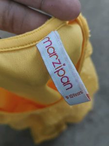 Yellow Ruffle Peplum Top