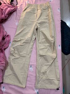 Beige parachute trousers