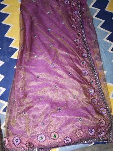Net saree in purple colour havingg 2 shining shade