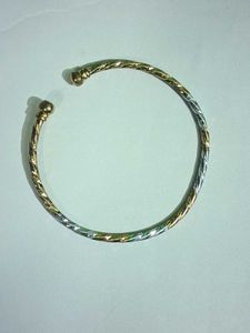 Elegant Gold And Silver Bracelet