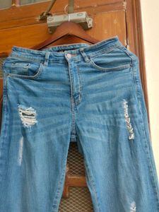 Pinterest-y Ripped Blue Bootcut Jeans