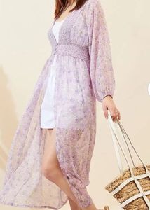 Floral Shrug In a Very Good Condition