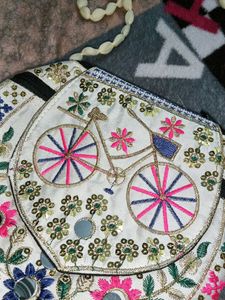 A Multicolour Bag With Khadai