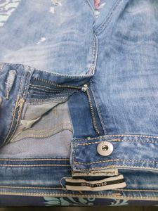 Distressed Denim Jeans
