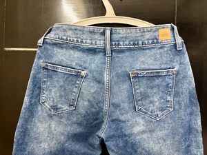 Benetton mid waist cropped light fade jeans