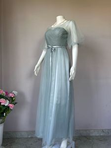 Soft tulle dusty blue gown