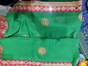 Beautiful Fluorescent Green Saree With Pink Blouse