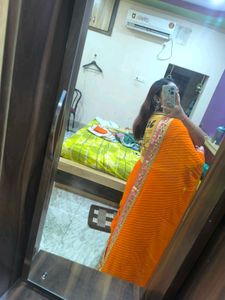 Elegant striped Orange Saree