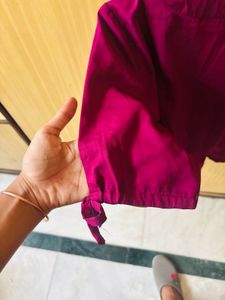Magenta Ruffle Hem Blouse