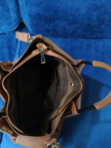 Brown Bag With Cutwork Design In Front