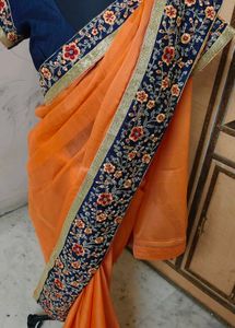 Elegant Orange Embroidered Saree 💕