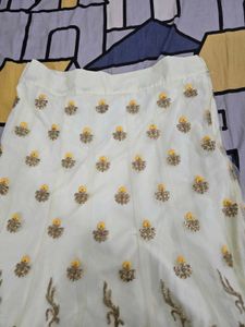 net lehanga with embroidery