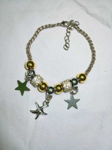 golden & silver drop star wristlet chain bracelet