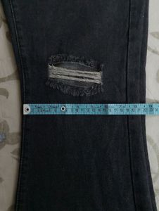 URBANIC HEAVY DISTRESSED BOOTCUT BLACK JEANS