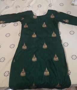 Dark Green Kurta With Golden Jumka Design