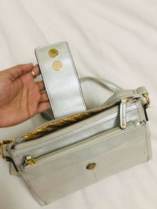 Imported Silver Crossbody Bag