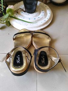 Heel&#39;s Black &amp; Gold Sandals