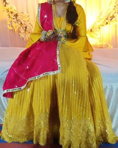 yellow lahenga choli with marron dupatta
