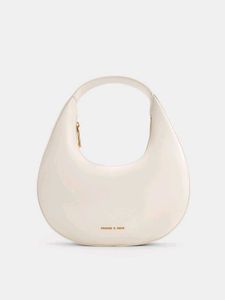 CHARLES & KEITH Cream Philomena Half-Moon Bag