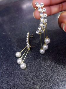 Zirconia Earrings With Dangling Pearls
