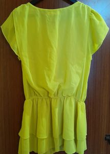 yellow cinched waist top