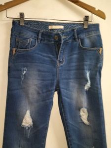 Distressed Denim Jeans