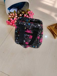 2. Black Floral Handbag