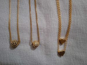 Gold tone layered necklaces