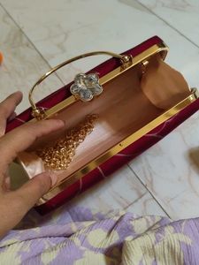 Maroon Printed Leaf Hand Clutch With Sling