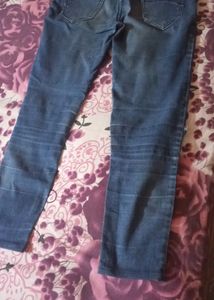 Fadded Damaged Blue Jeans