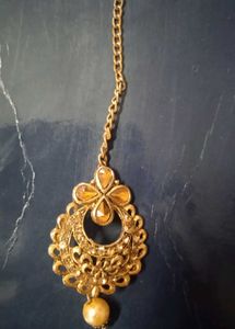 gold matika with beautiful locket