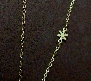 Gold Snowflake Pendant Necklace