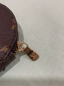 Mini Clutch On Any Bag Louis Vuitton