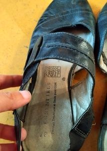Black flat closed toe sandals