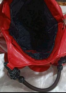 Red Handbag with Unique Design