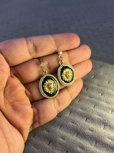 Gold &amp; Black Lion Earrings