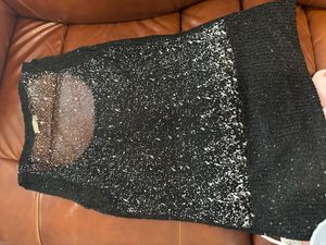 A Black Sequin Top With Net Back