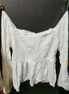 White peplum top with waist snatch