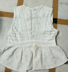 White Embroidered Peplum Top